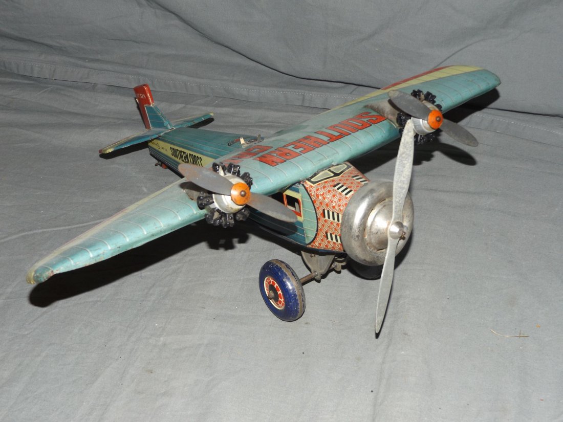 Tin Litho Wind Up Airplane. (1 of 5)