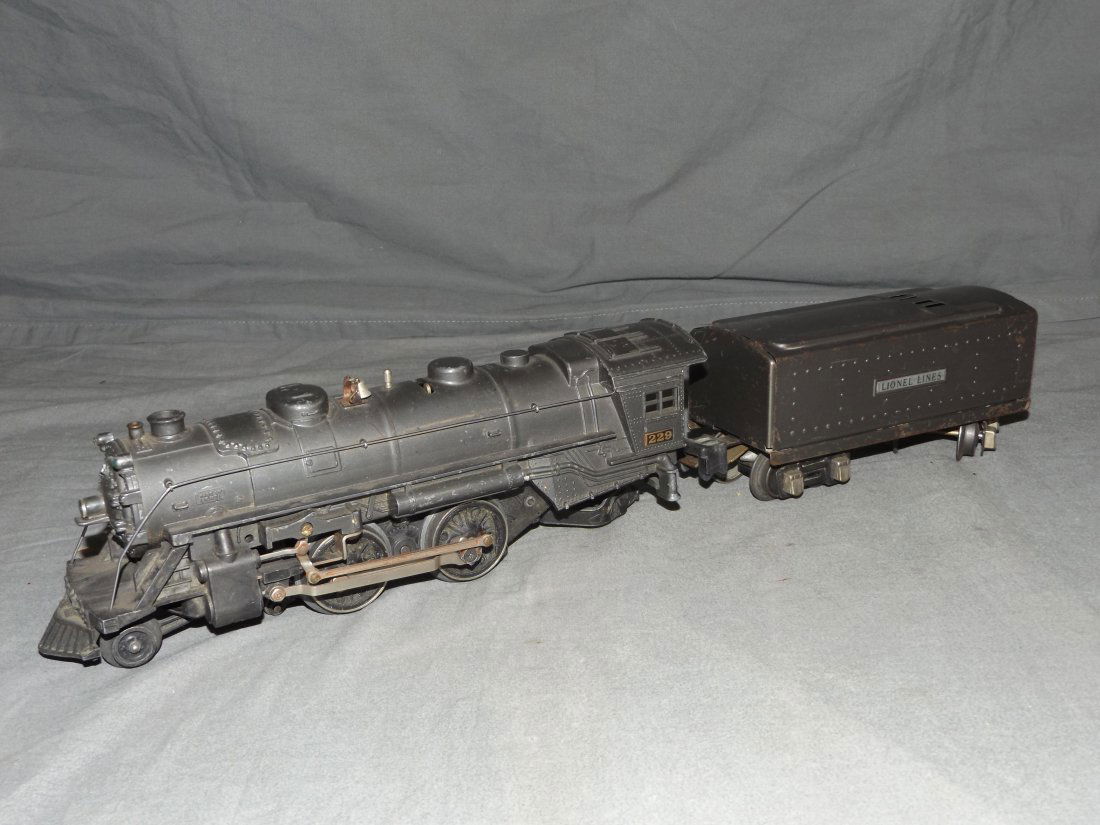 Lionel Pre War Steam Loco & Tender: 2 pieces. Includes 229 Gun Metal 2-4-2 Steam Loco, and 1689 Gun Metal Tender.