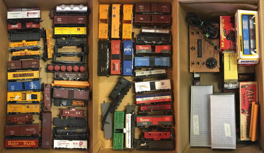 Large Lot of HO Assorted Trains: Over 60 pieces. Includes (3) brass locomotives, (1) brass NYC tender, and over 50 assorted HO trains including flats, cabooses, tank cars, box cars, reefers, hoppers, transformer and more. Some of the