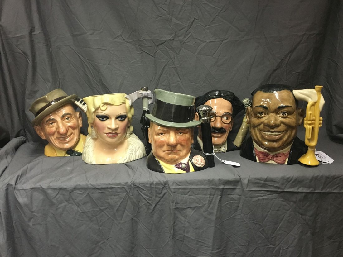 (5) Royal Doulton Jugs. The Celebrity Collection.: Lot consists of 5 jugs from the Royal Doulton Celebrity Collection including Louis Armstrong, Groucho Marx, Jimmy Durante, Mae West and W. C. Fields. Nice overall condition. Examine
