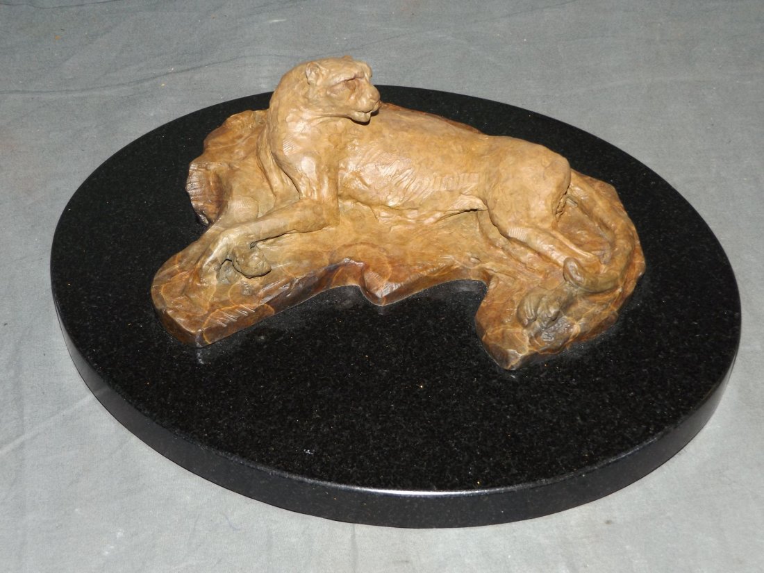 Richard MacDonald (born 1946) Bronze.: Cheetah Reclining. 8" x 7" without base 10 1/2" x 12 1/2" with base. Initialled and dated 96.