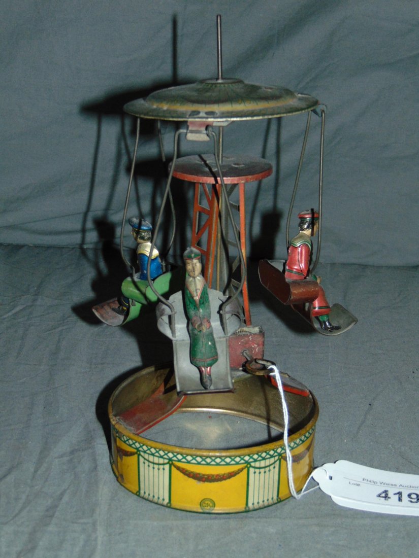 M&K Tin Litho Windup Go Round with Children (1 of 3)
