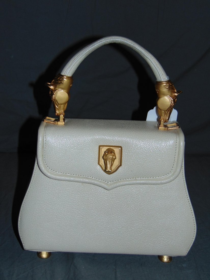 Vicenza Inc. Purse/Handbag. 1993. Beige.: Vicenza Inc. Beige leather handbag, with gilt horse head motifs, 1993, H 10", W 9": Original tag from Sacks Fifth Avenue. $615.00 included.