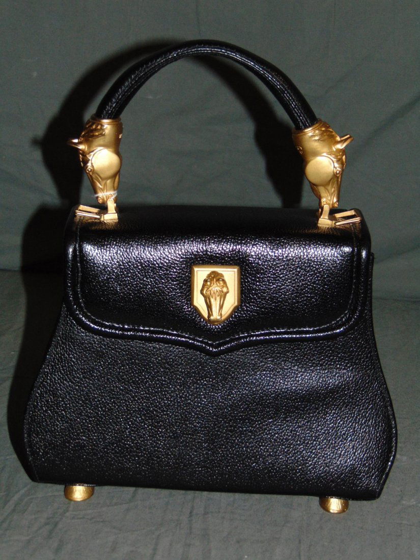 Vicenza Inc. Purse/Handbag. 1993. Black.: Vicenza Inc. Black leather handbag, with gilt horse head motifs, 1993, H 10", W 9": Original tag from Sacks Fifth Avenue. $615.00 included.