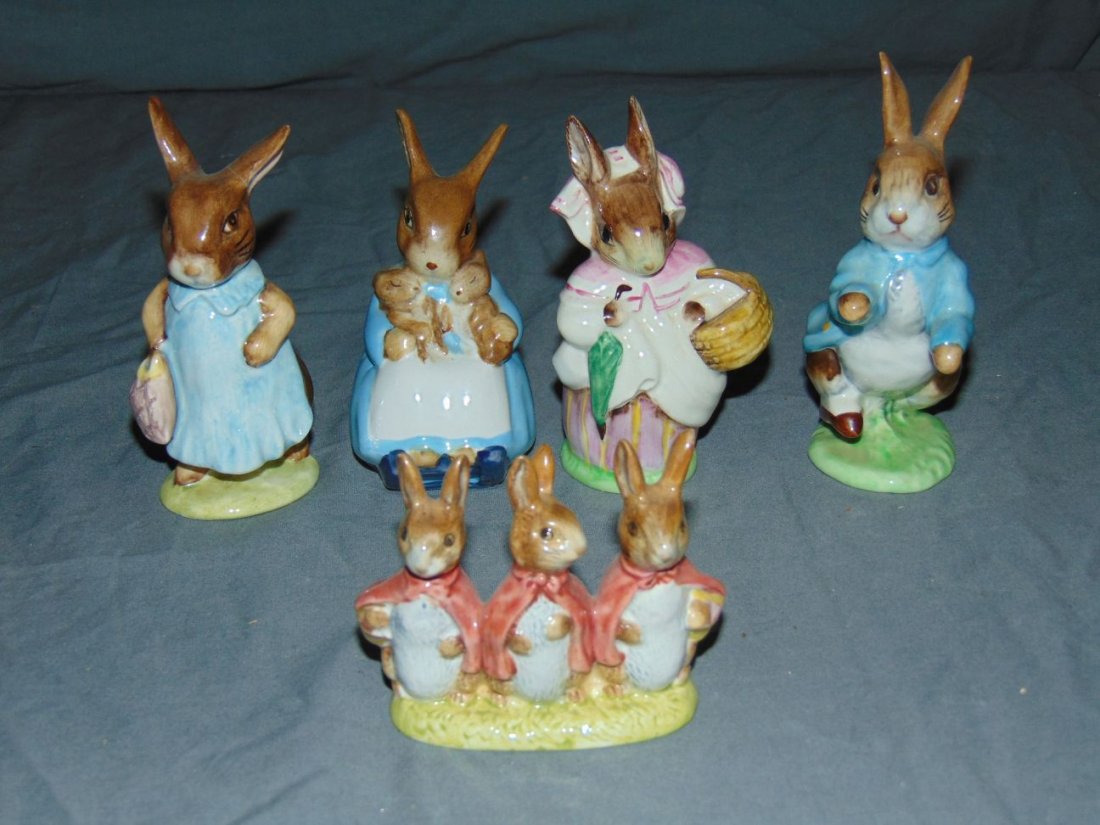 Beatrix Potter Figurines. Lot of 5.: includes Flopsy Mopsy and Cottontail, Mrs Flopsy Bunny, Mrs Rabbid and Bunny, Peter Rabbit and Mrs. Rabbit. Made by F. Wayne & Co ltd Beswick England. Nice overall condition. Examine.