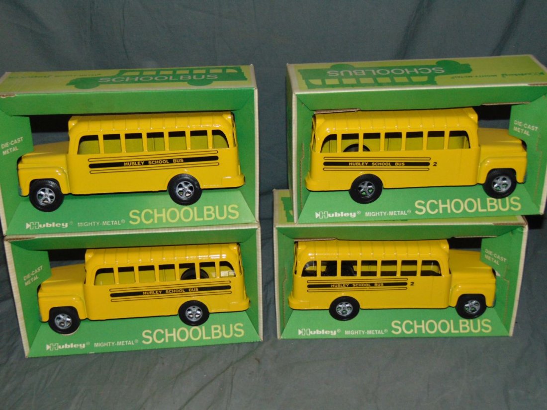 Hubley Mighty Metal School Bus.: Lot of Four New in Boxes.