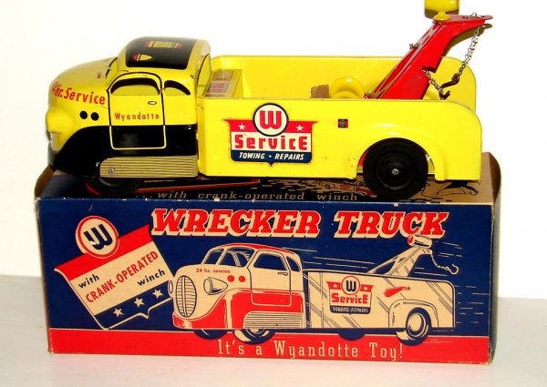 1950'S WYANDOTTE WRECKER TRUCK IN ORIG BOX LOT CO: 1950'S WYANDOTTE WRECKER TRUCK IN ORIG BOX LOT CONSISTS OF A VINTAGE, TIN LITHO, "WRECKER TRUCK" BY WYANDOTTE, NO.326, CIRCA 1950'S. APPROX. 13-1/2" LONG. SIDE DECALS ARE PRESENT. TRUCK HAS SOME LIGHT