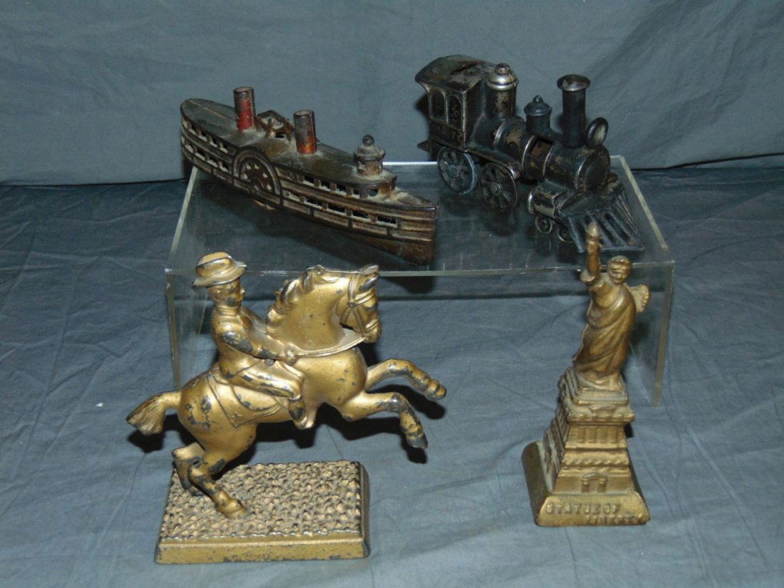 Cast Iron Still Bank Lot. (1 of 2)