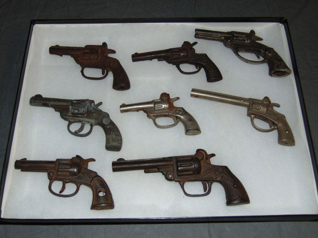 Vintage Lot of Toy Cap Guns: Great lot of vintage toy cap guns including cast iron. Some included are Hero, Pony, Bull, Buddy, Western, and more. Some wear to each. Examine
