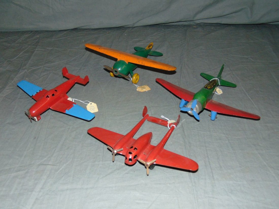 Lot of Four Steel Airplanes. (1 of 2)
