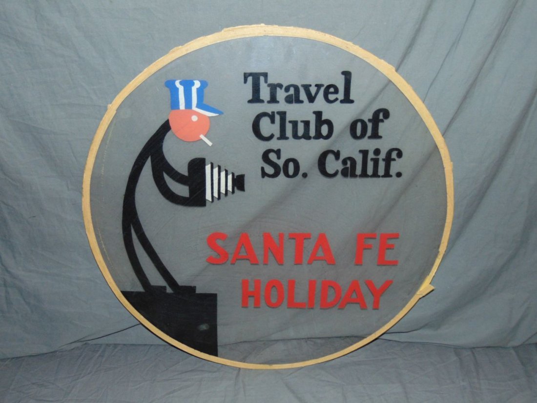 Santa Fe Holiday Tail End Sign: "Travel Club of So. Calif....Santa Fe Holiday". Round plexiglass sign, approx. 26" diameter. Some surface scuffs and scratches.