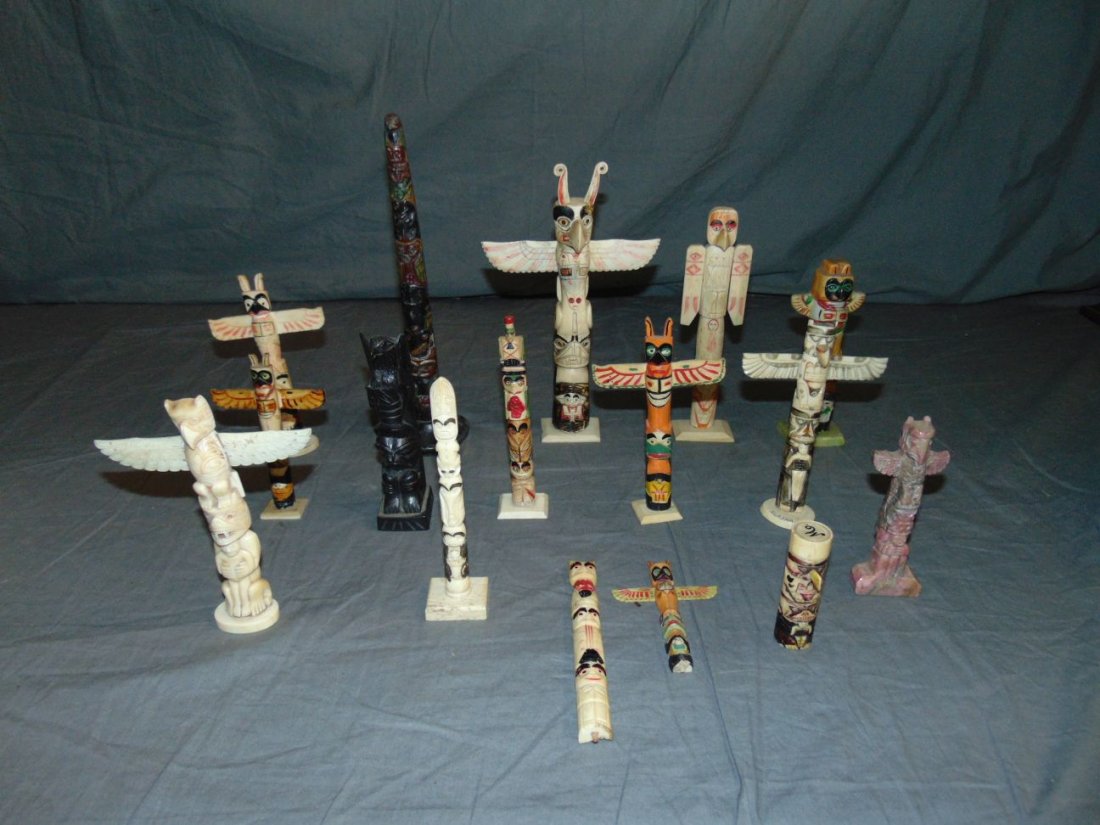 Lot of Small Size Indian Totem Poles.: 16 pieces various sizes with the largest being 10". Includes Porcelain, Pot Metal, Hand Painted Bone.