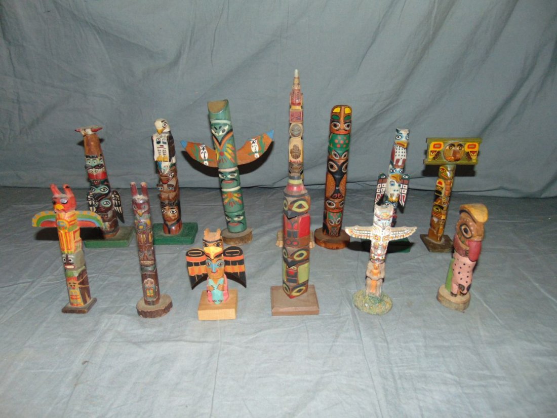Lot of 13 Totem Poles.: All Painted Wood various sizes, the largest is 11"