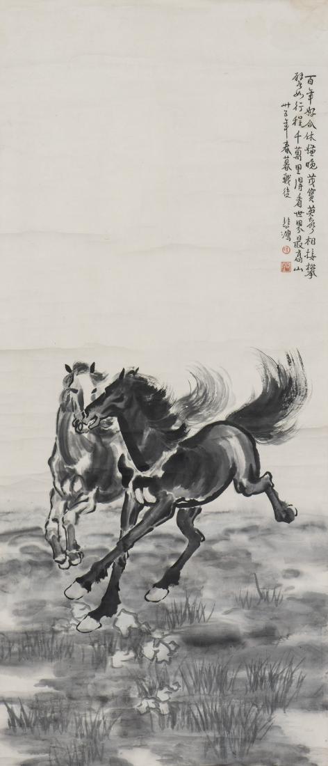 A HANGING SCROLL PAINTING OF HORSES: The hanging scroll painting of two horses, ink on paper, signed Xu Beihong, with two red seal marks. Height 51'' Width 22''