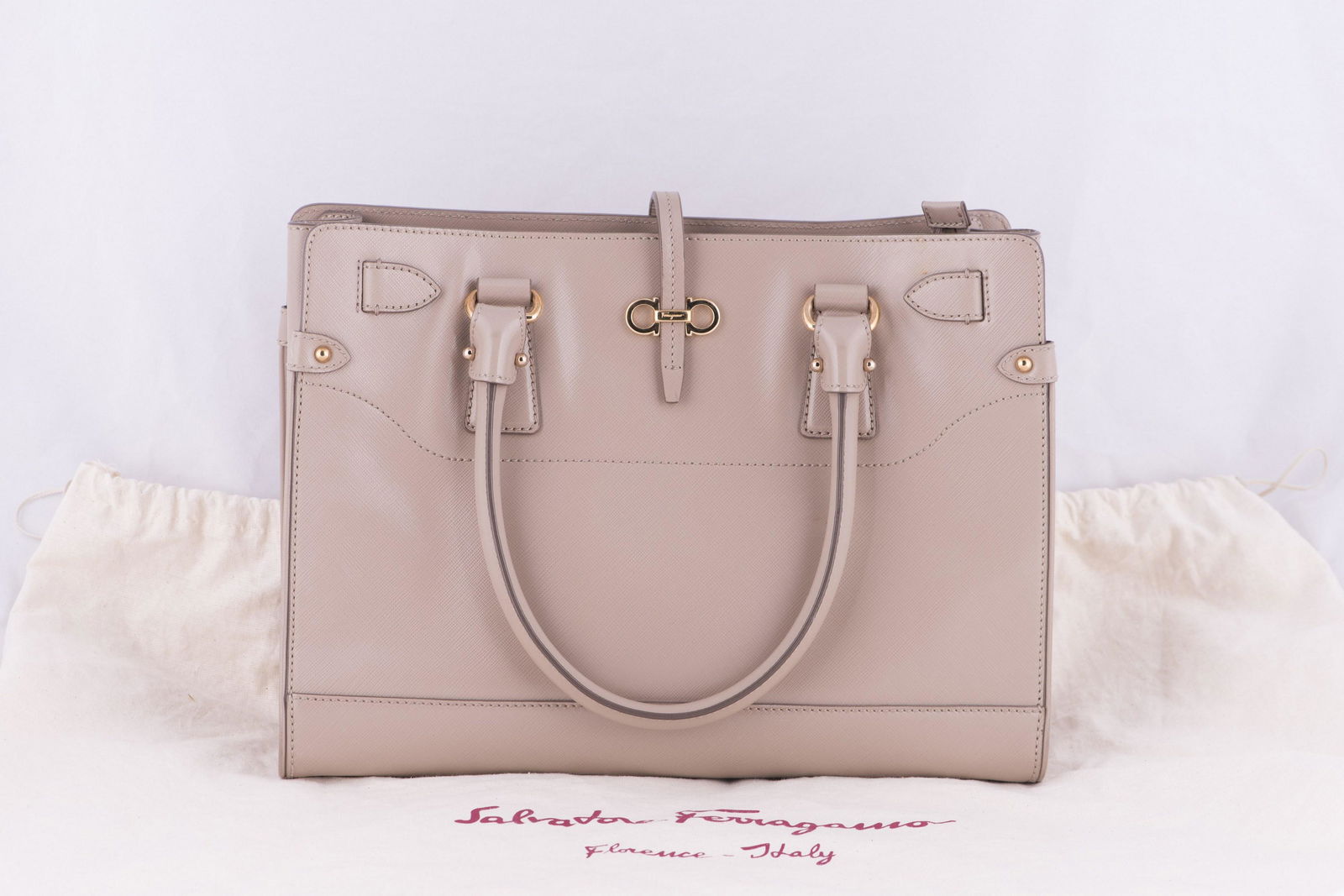 SALVATORE FERRAGAMO TOTE BAG NEW BATIK MACARON SAFFIANO: Salvatore Ferragamo saffiano leather tote bag; golden hardware and tonal topstitching; rolled tote handles, 5 1/2” drop; removable shoulder strap, 19” drop; top zip closure and open compar