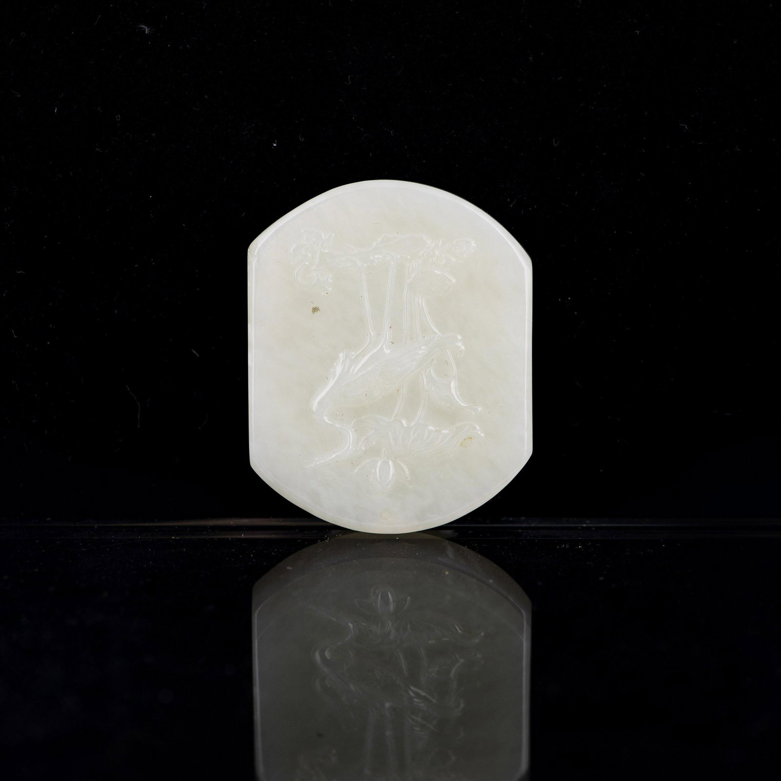 JADE PLAQUE WITH CRANE RELIEF: Jade Plaque with Crane relief of clean colors and exquisite carving. H5x3.8cm