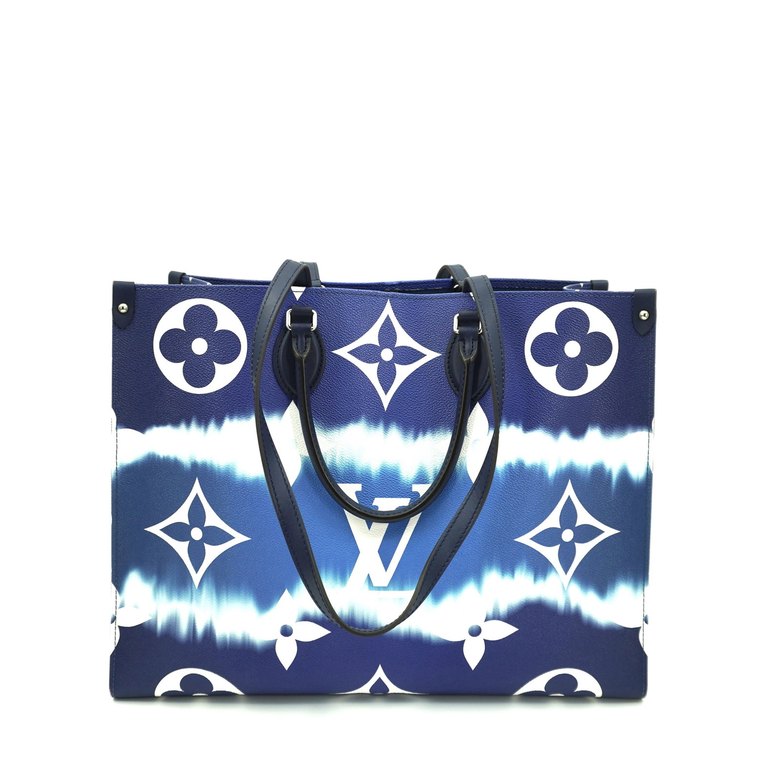 A LOUIS VUITTON LARGE TIE DIE ON THE GO TOTE: A Louis Vuitton large tote on the go 'tie die' collction. Conditon: minor wears on the corners, minor stains inside, limited edition. 42x33cm