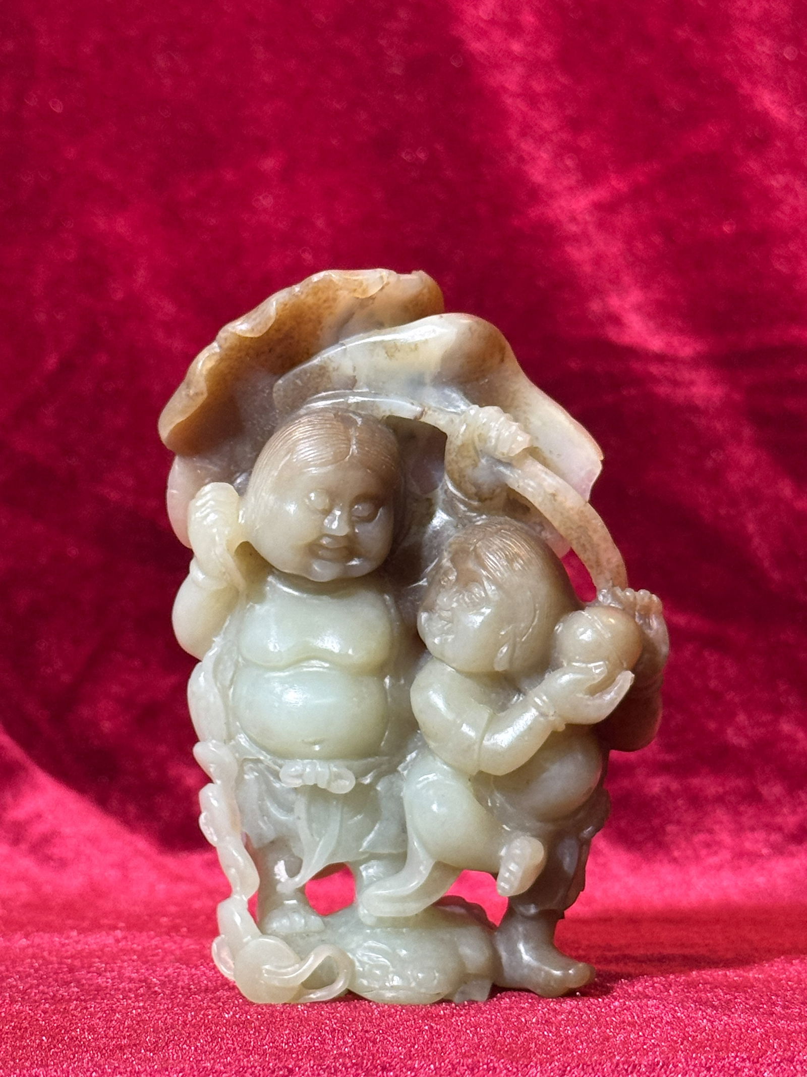 Chinese Jade Carving of Hehe Immortals: Chinese celadon jade carving of hehe immortals, 4"h (10.16 cm) NOTE: THIS ITEM IS IN NEW YORK, WHERE IT CAN BE SHIPPED.