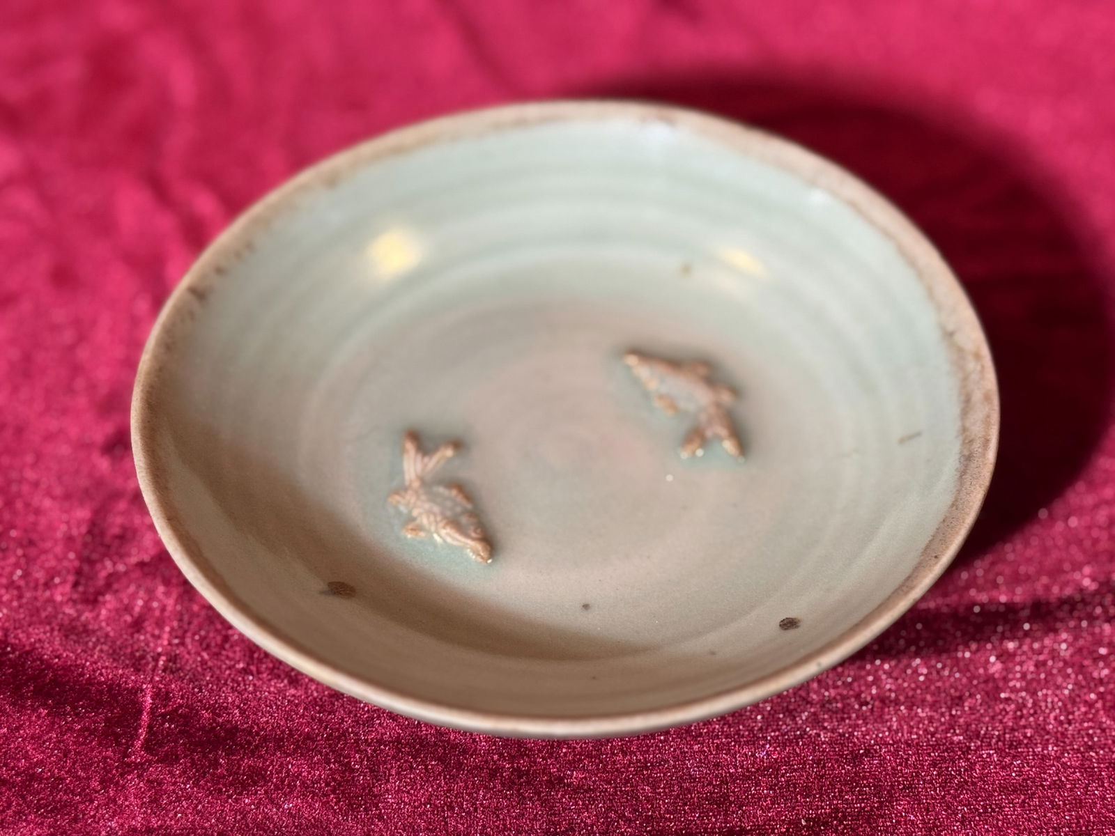 Chinese Celadon Porcelain Dish with Two Fish: Chinese celadon porcelain dish with two molded fish design, 5.75"dia (14.61 cm) NOTE: THIS ITEM IS IN NEW YORK, WHERE IT CAN BE SHIPPED.