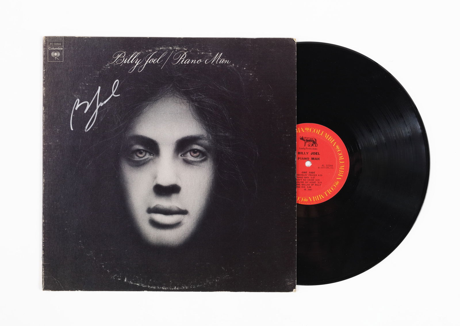 BILLY JOEL VINYL RECORD 'PIANO MAN' BEARING SIGNATURE: Billy Joel album 'Piano Man'. Released by Columbia Records in 1973. The cover features a black-and-white portrait of Billy Joel. The cover bears a signature in black marker reading Billy Joel. Dimensi