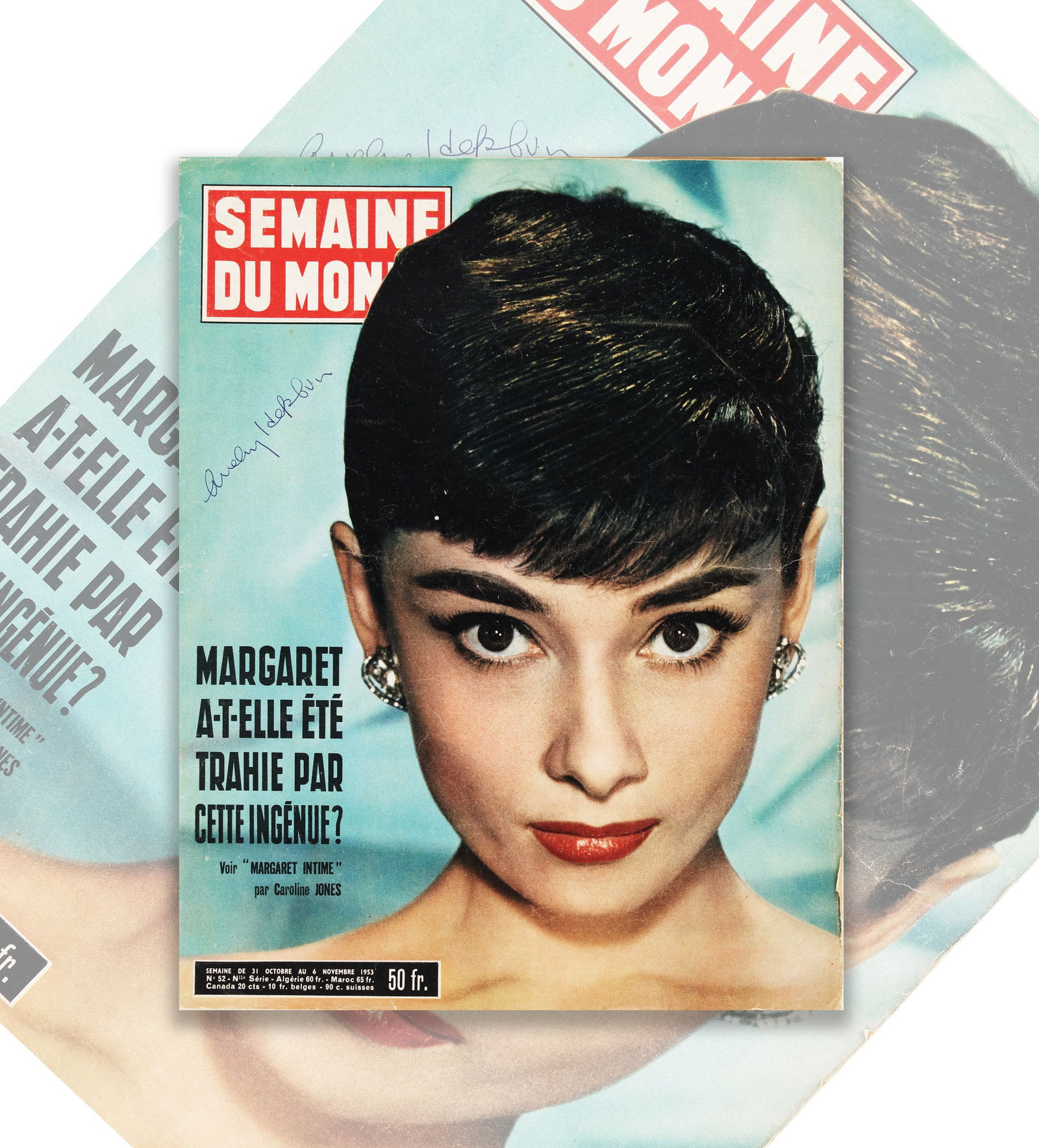 AUDREY HEPBURN SEMAINE DU MONDE MAGAZINE BEARING SIGNATURE: Copy of 'Semaine du Monde' (1950s). Cover features Audrey Hepburn. Bears a signature in blue ballpoint pen reading 'Audrey Hepburn'.