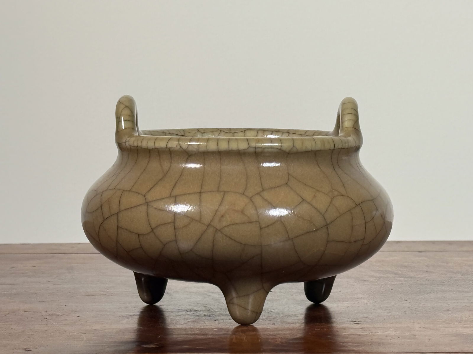 CHINESE MUSTARD YELLOW GUAN CRACKLE GLAZED PORCELAIN CENSER: Chinese mustard yellow glaze Guan crackle porcelain censer.Dimensions: Diameter: 5 in. Height: 3.25 in.Note: This item is in New York, where it can be shipped from.