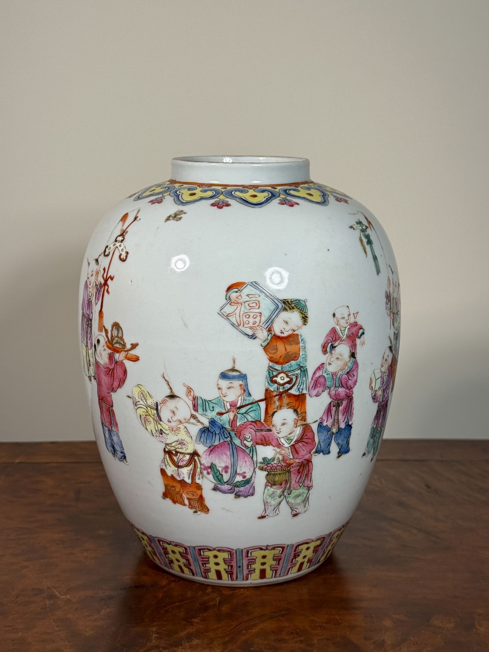 CHINESE FAMILLE ROSE PORCELAIN JAR WITH BOY PLAYING SCENE: Chinese Famille Rose porcelain vase with boy playing scene. Dimensions: Height: 8.5 in. Note: This item is in New York, where it can be shipped from.