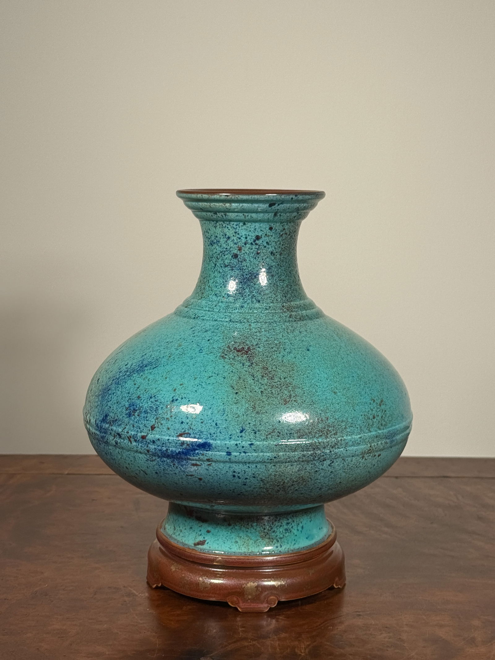 CHINESE PORCELAIN VASE WITH TURQUOISE GLAZE: Chinese turquoise glazed porcelain vase with variation splashing glaze, molded mark. Small chip on one foot edge. Dimensions: Height: 8 in. Note: This item is in New York, where it can be shipped from