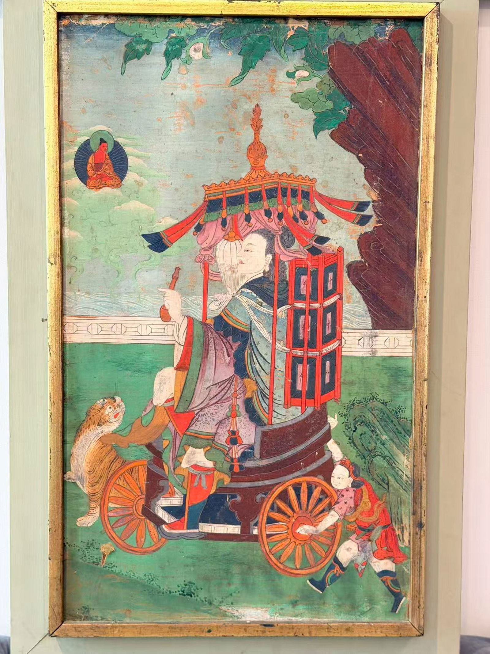 TIBETAN THANGKA WITH MONK IN WAGON SCENE: Tibetan Thangka of monk in wagon scene, along with various spiritual animals. Dimensions: 16.5 x 27 in. Note: This item is in New York, where it can be shipped from.