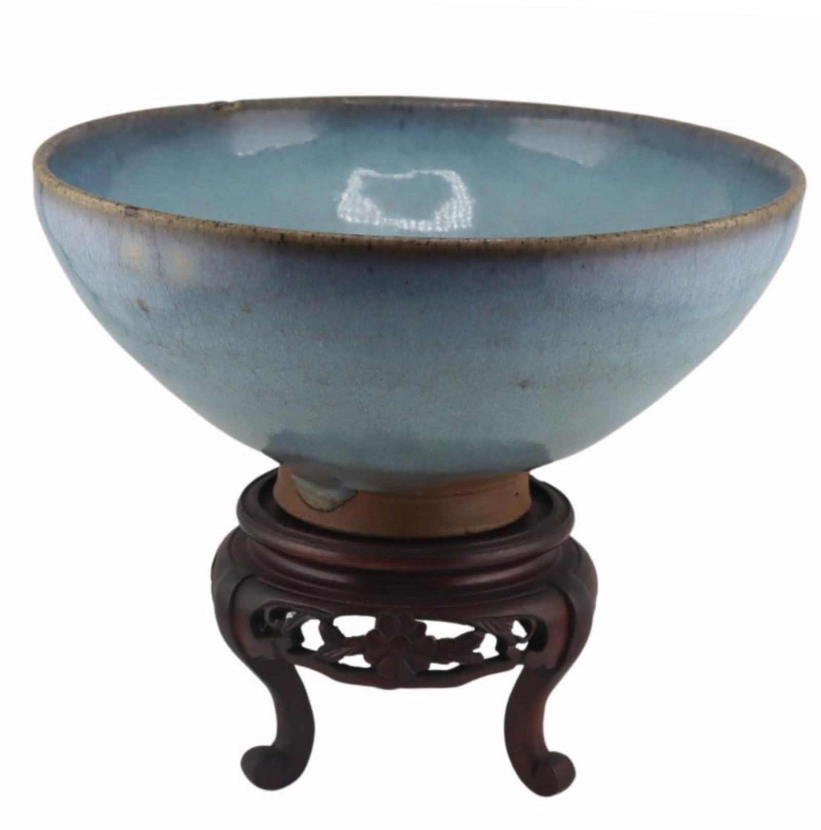 CHINESE JUN KILN PORCELAIN BOWL ON STAND: Chinese Jun Kiln porcelain bowl on wood stand, has faint hairline extending from rim. Dimensions: Diameter: 8 in. Height: 3.75 in. Note: This item is in New York, where it can be shipped from.