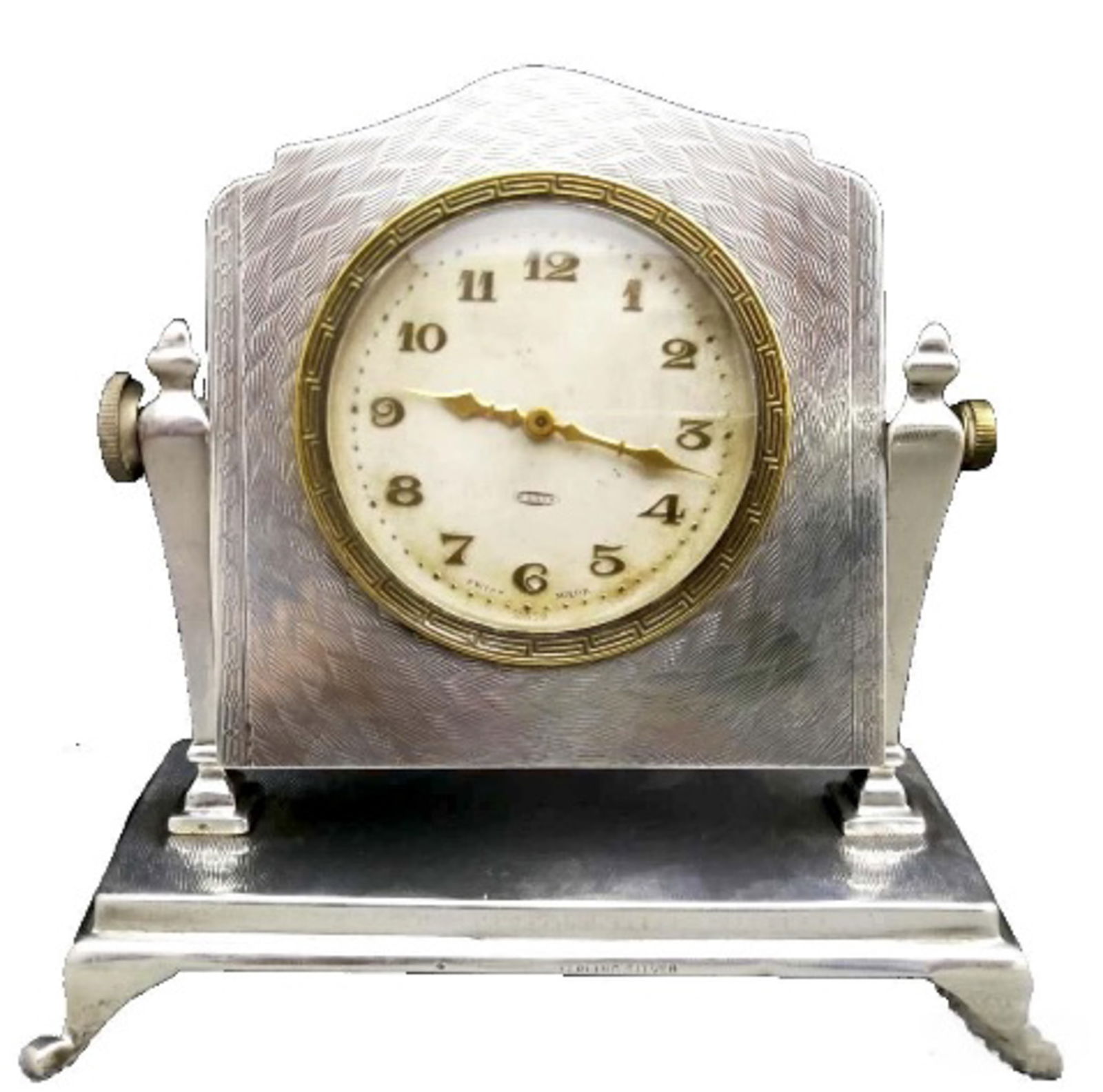 BRITISH PURE SILVER SMALL TABLE CLOCK: A British silver small table clock featuring a silver emblem. The piece is equipped with a Swiss movement. Dimensions: 12 x 11 x 5.5 cm. Weight: 269 g. All measurements are approximate.