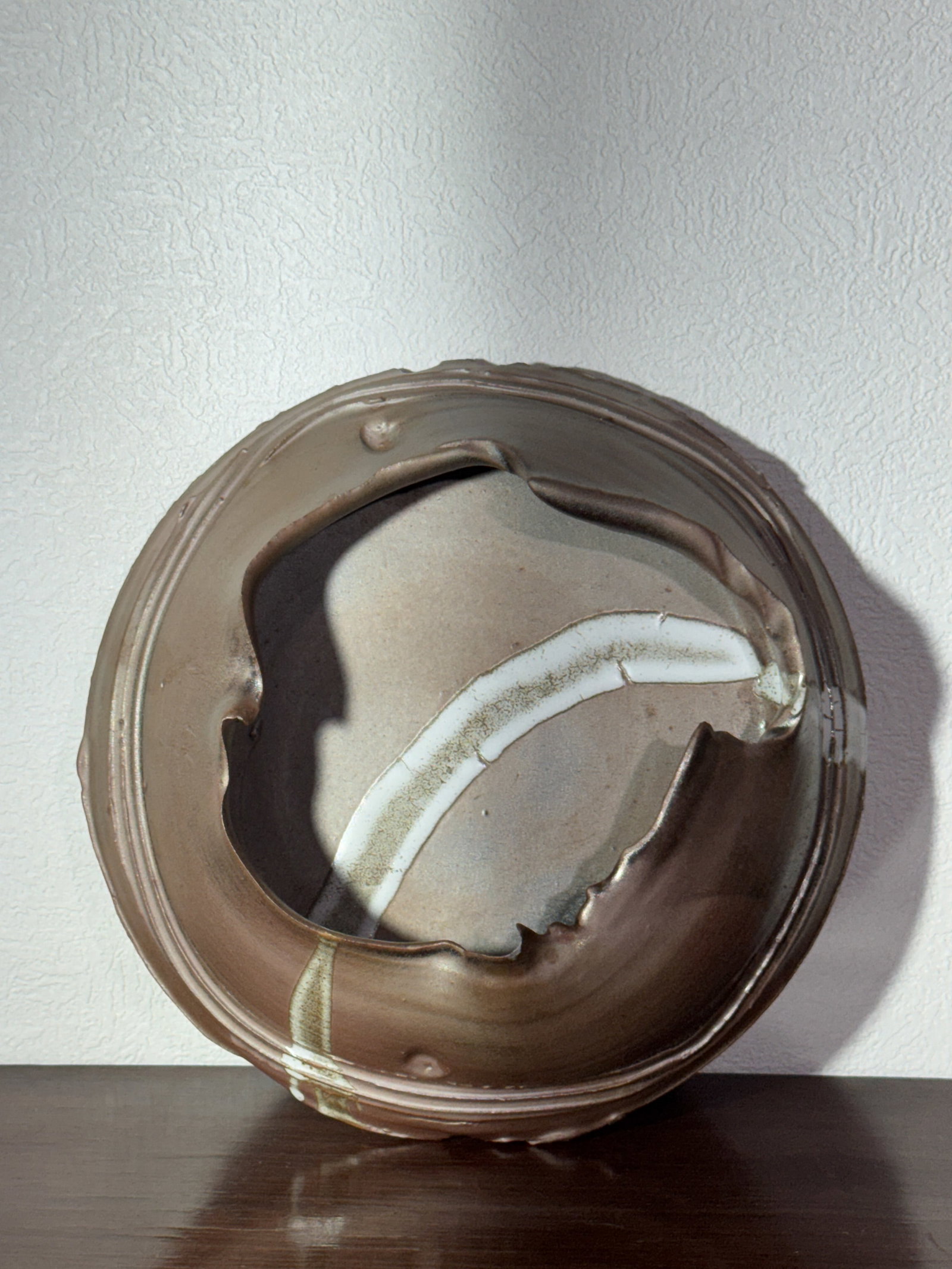 JAPANESE CONTEMPORAY DESIGN STUDIO PORCELAIN WALL VASE: Japanese studio porcelain wall vase with contemporary design. Dimensions: Diameter: 10 in. (25.4 cm) Note: This item is in New York, where it can be shipped from.