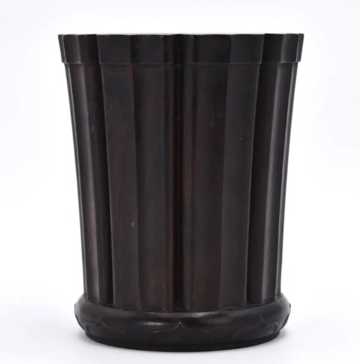 CHINESE ZITAN WOOD CARVED BRUSHPOT, QING DYNASTY: Chinese zitan wood-carved brush pot with rounded lotus-style base expanding upwards to lotus-shaped flat rim. 5.79"h x 4.72"d (14.7 x 12 cm) Provenance: New York private collection 