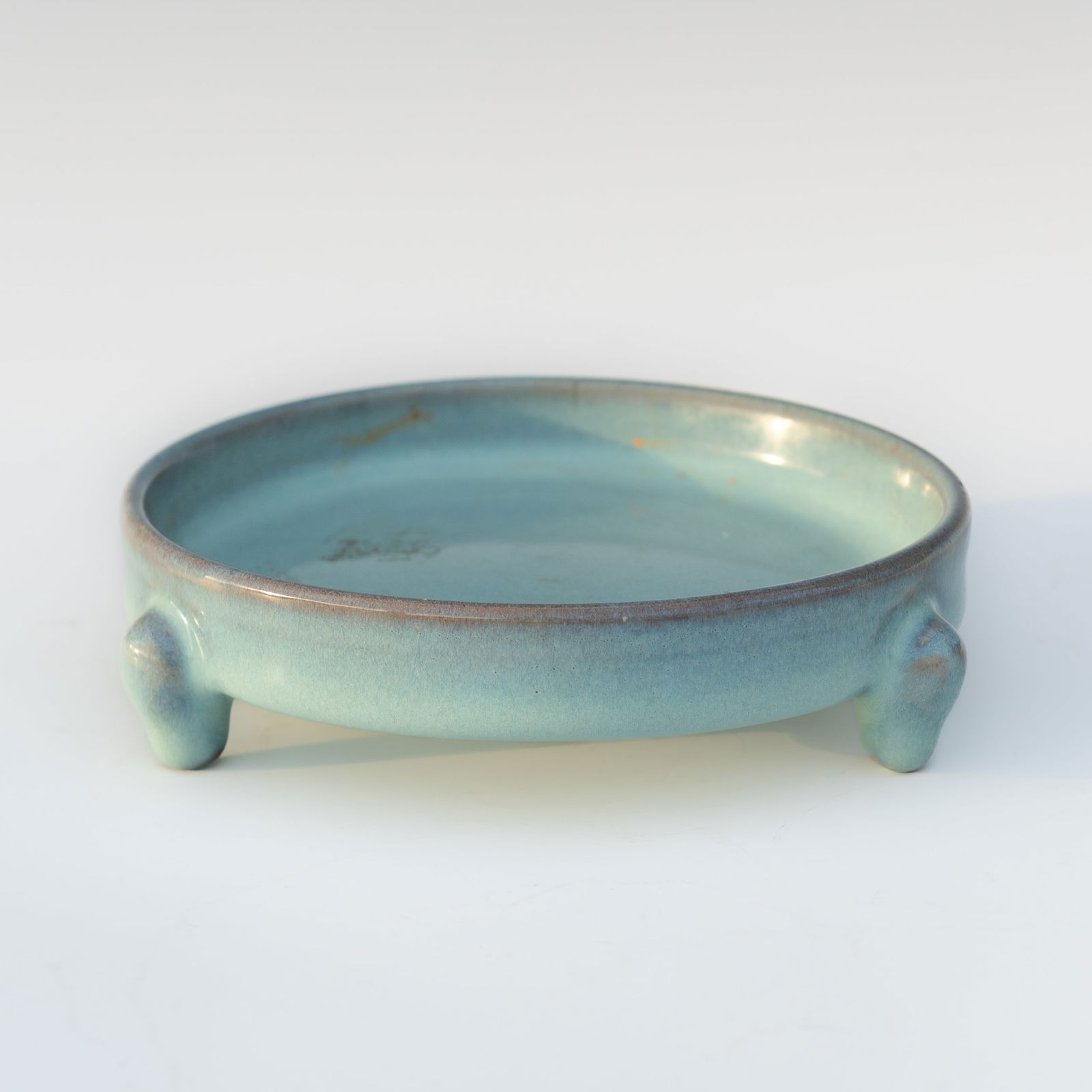 CHINESE JUN WARE TRIPOD DISH, POSSIBLY SONG DYNASTY: Chinese jun ware tripod dish, possibly Sony Dynasty. 1.5"h x 5.91"d (3.8 x 15 cm) Provenance: Property from an estate in Georgia.