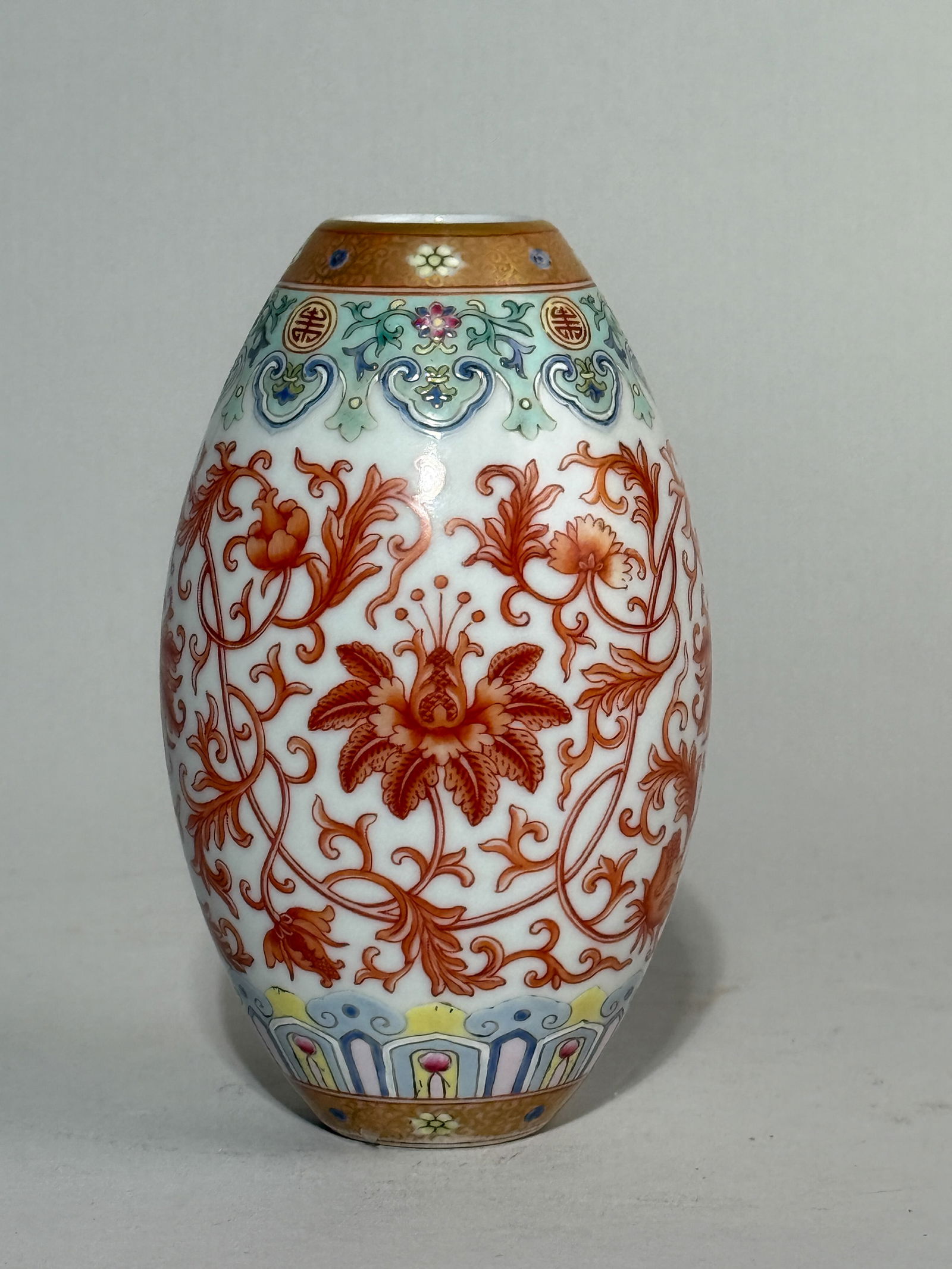 A CHINESE OVOID SHAPED PORCELAIN VASE WITH IRON-RED DECORATION: A Chinese ovoid-shaped porcelain vase with iron-red decoration. Dimensions: Height: 5.25 in. (13.3 cm).