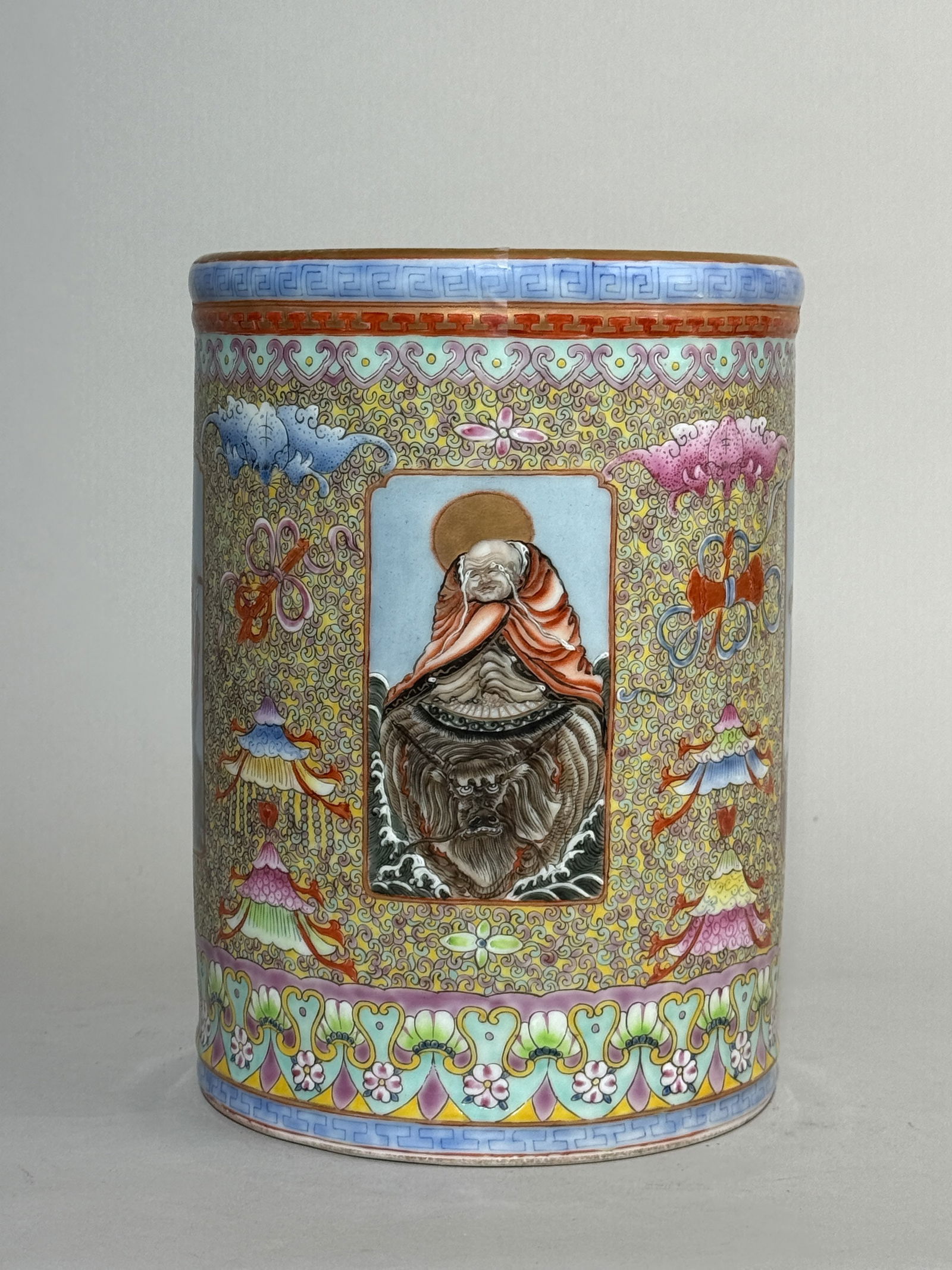 A CHINESE FAMILLE ROSE PORCELAIN VASE WITH IMMORTAL SCENE: A Chinese Famille Rose porcelain vase decorated with an immortal scene. Bottom with a crazing line in the glaze which does not reflect on the interior. Dimensions: Height: 9.25 in. (23.5 cm); Diameter