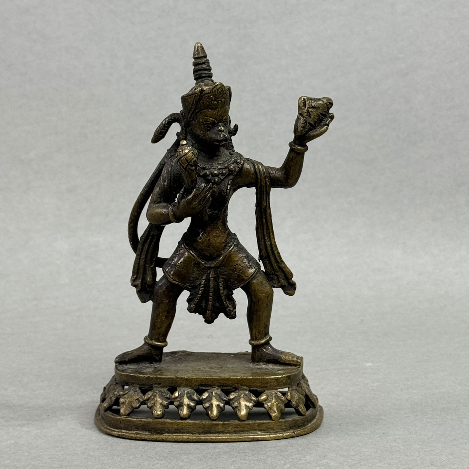 AN ANTIQUE INDIAN BRONZE HANUMAN: An antique Indian bronze Hanuman, 18th/19th century. Dimensions: Height: 6 in. (15.2 cm).