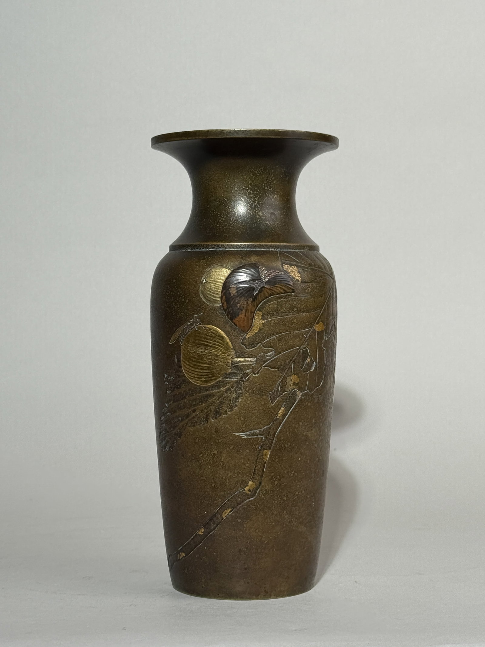 A JAPANESE MEIJI MIXED METAL VASE WITH FRUIT MOTIF: A Japanese Meiji mixed metal vase with a fruit motif. Dimensions: Height: 8.5 in. (21.6 cm).