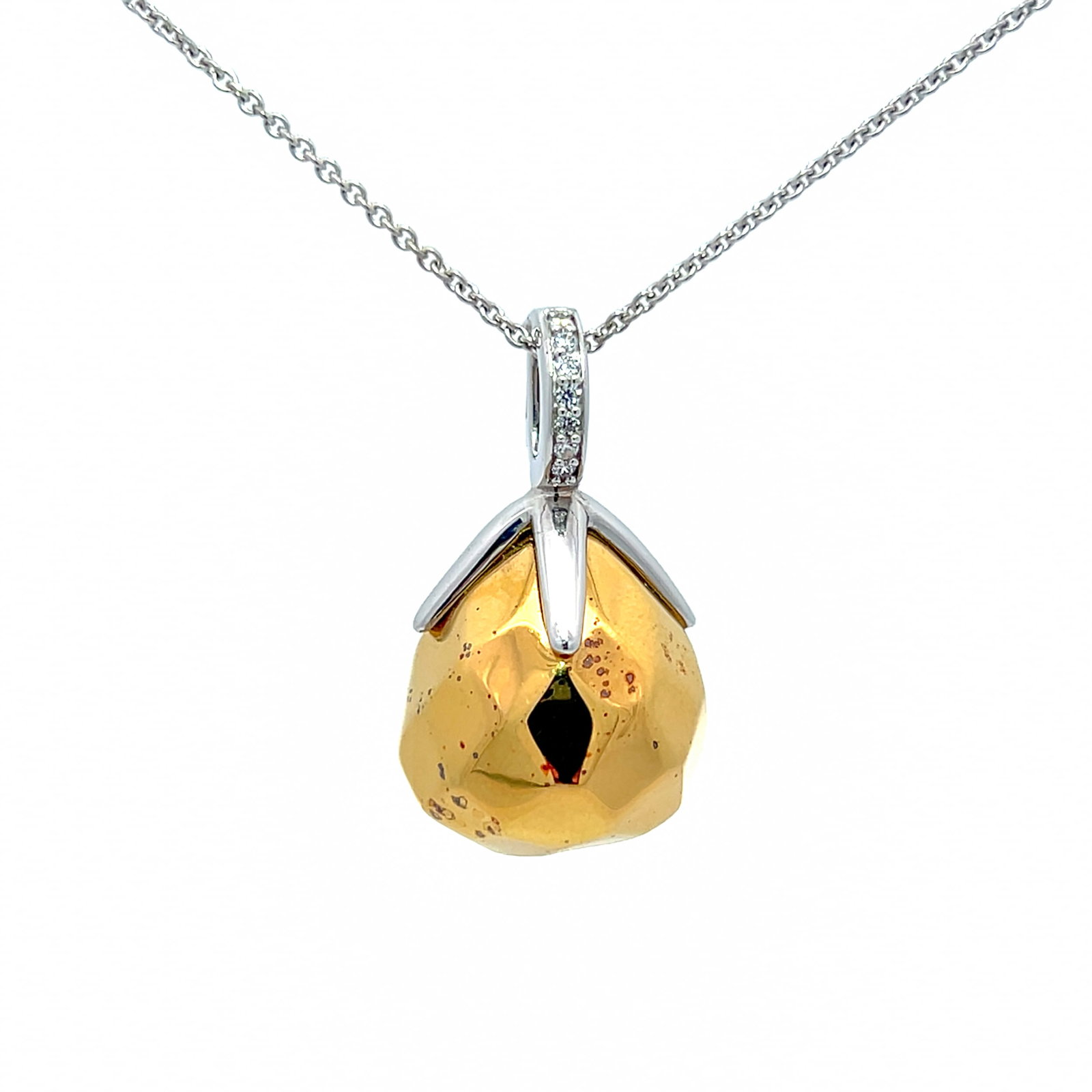 A TI SENTO GOLD-PLATED SILVER PENDANT NECKLACE: A TI SENTO gold-plated silver pendant necklace. L22 cm (x2); 2.5 x 1.5 cm; Overall 11 grams.