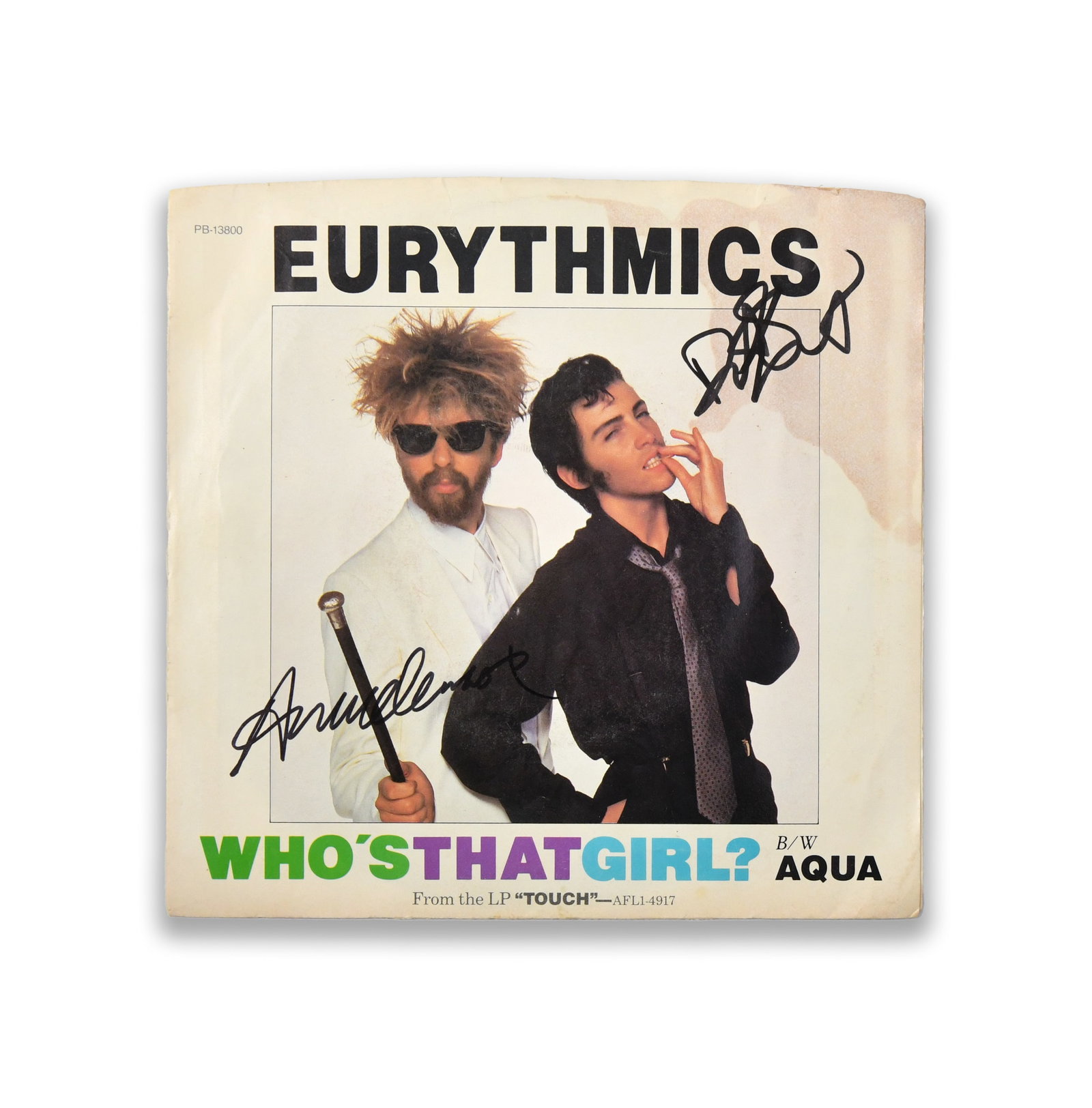 EURYTHMICS SINGLE DISPLAY "WHO'S THAT GIRL?", BEARING SIGNATURES: The front sleeve presents the Eurythmics typography above a photographic portrait of the duo, bearing ink marks in the names of Lennox and Stewart. The reverse retains production credits and RCA