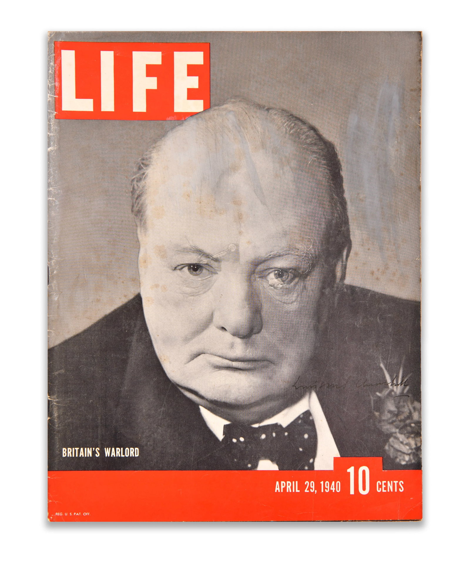 MAGAZINE "LIFE" (WINSTON CHURCHILL), BEARING SIGNATURE: The cover presents a black-and-white photographic portrait of Churchill, accompanied by the red "LIFE" masthead and the caption "Britain's Warlord". It bears an ink mark in the name of Winston