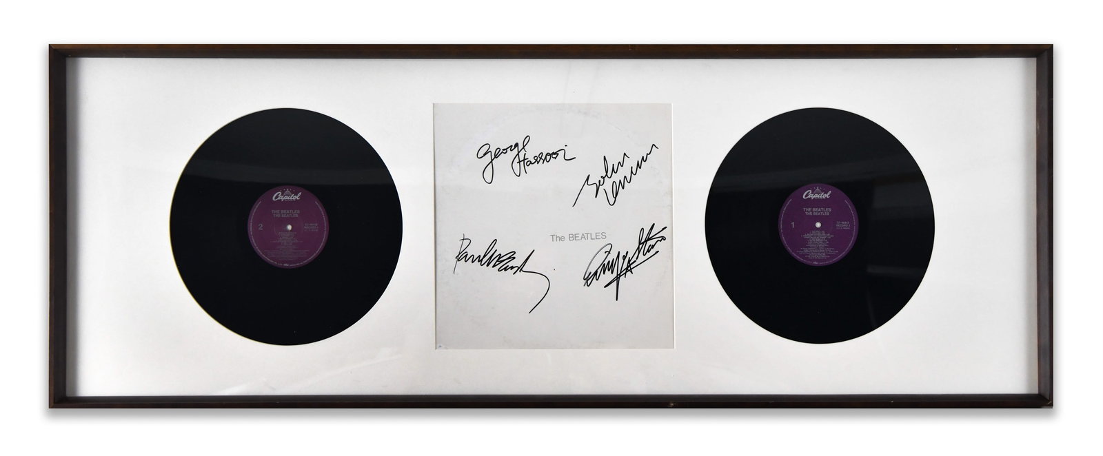 AUTOGRAPH PAGE IN FRAMED RECORD DISPLAY BEARING SIGNATURES ATTRIBUTED TO THE BEATLES (1 of 1)