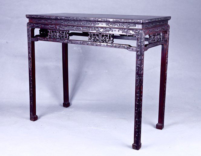Zitan Table: Zitan table, the rectangular form decorated with intricately carved. Height 34.5" Width 18.5" Length 40" 紫檀雕文案桌