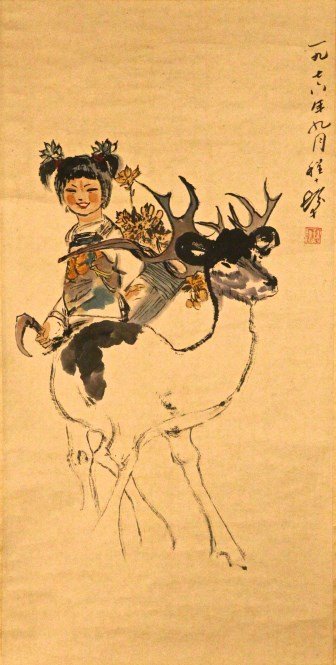 Chinese scroll painting: Chinese scroll painting depicting a smiling little girl standing behind a lively deer, of multi-color. This would be a perfect Chinese work of art for decoration. Length 18.5" Height 37.25" 水&#