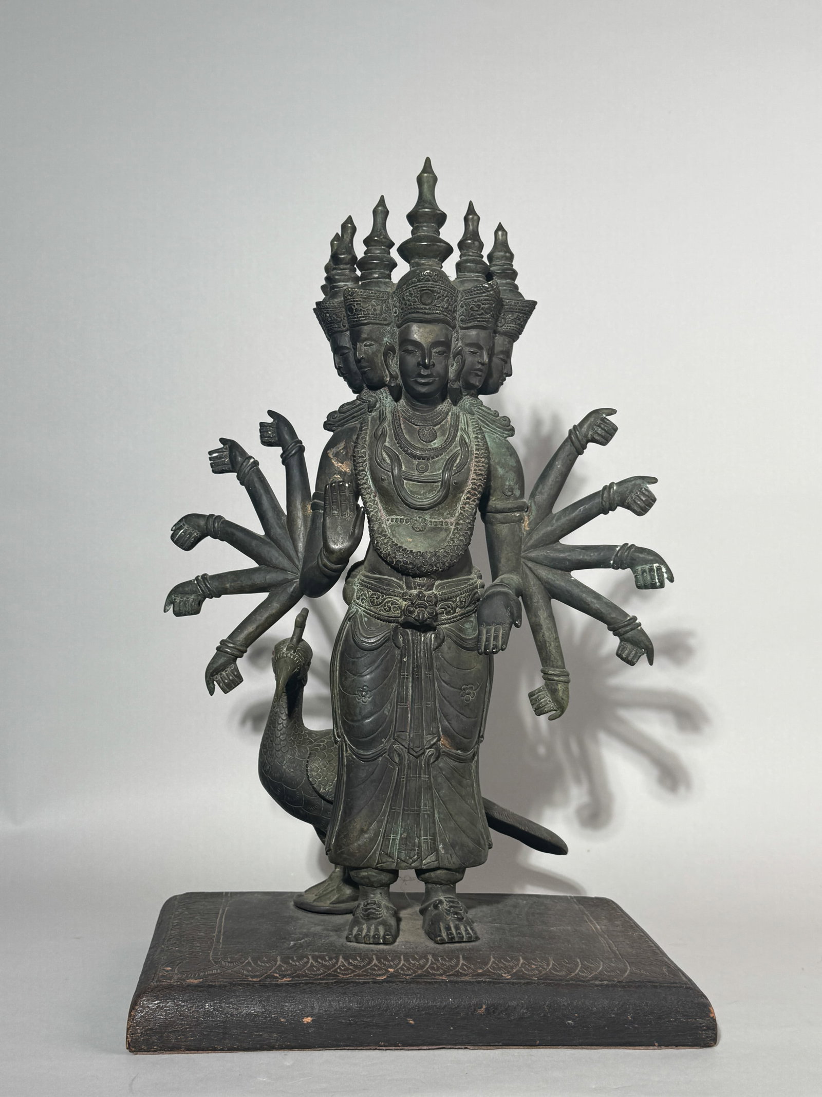 AN ANTIQUE BURMESE BRONZE STANDING DEITY WITH MULTI-ARMS (1 of 14)
