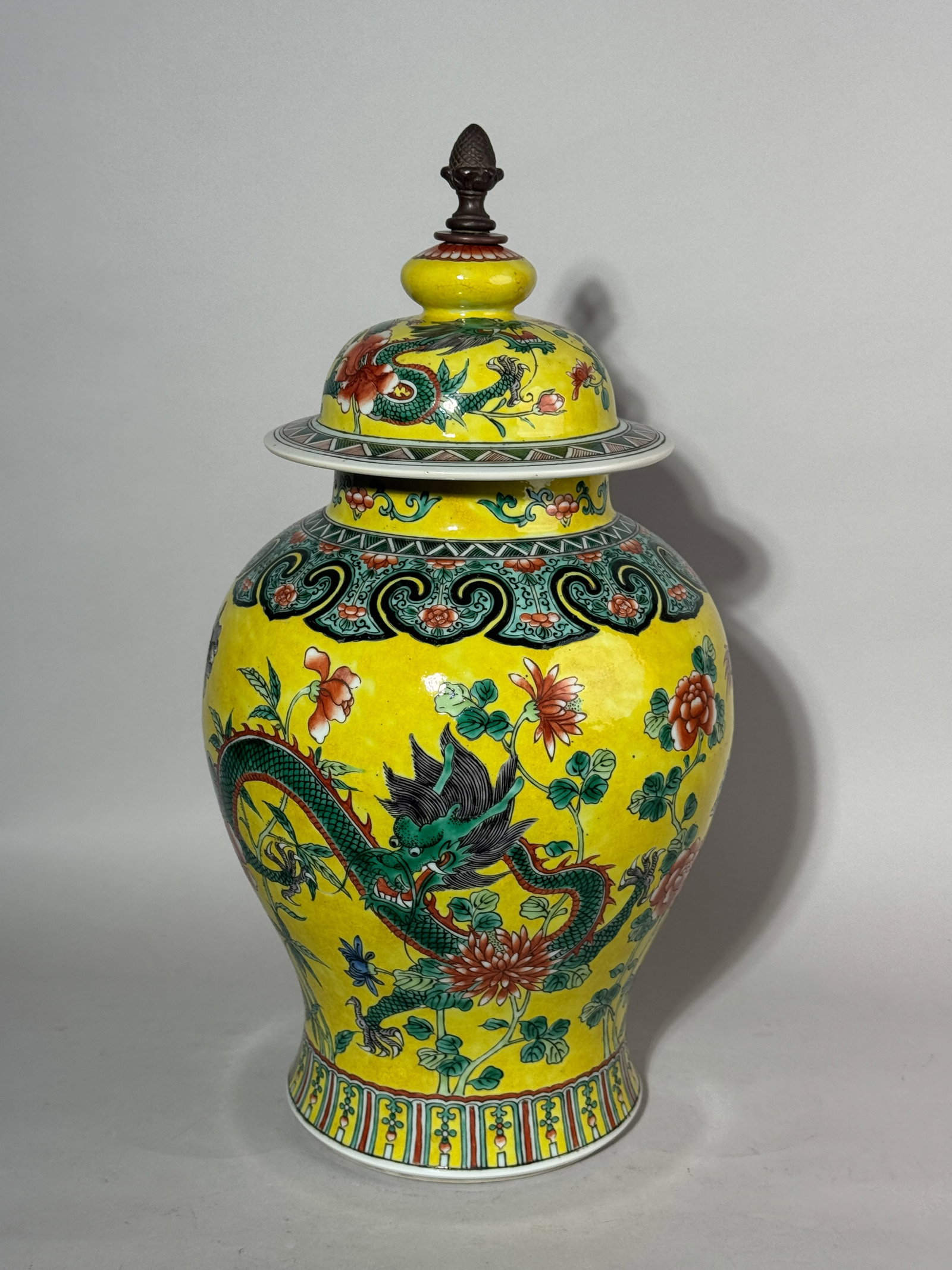 A CHINESE YELLOW-GROUND PORCELAIN TEMPLE JAR WITH DRAGON (1 of 12)