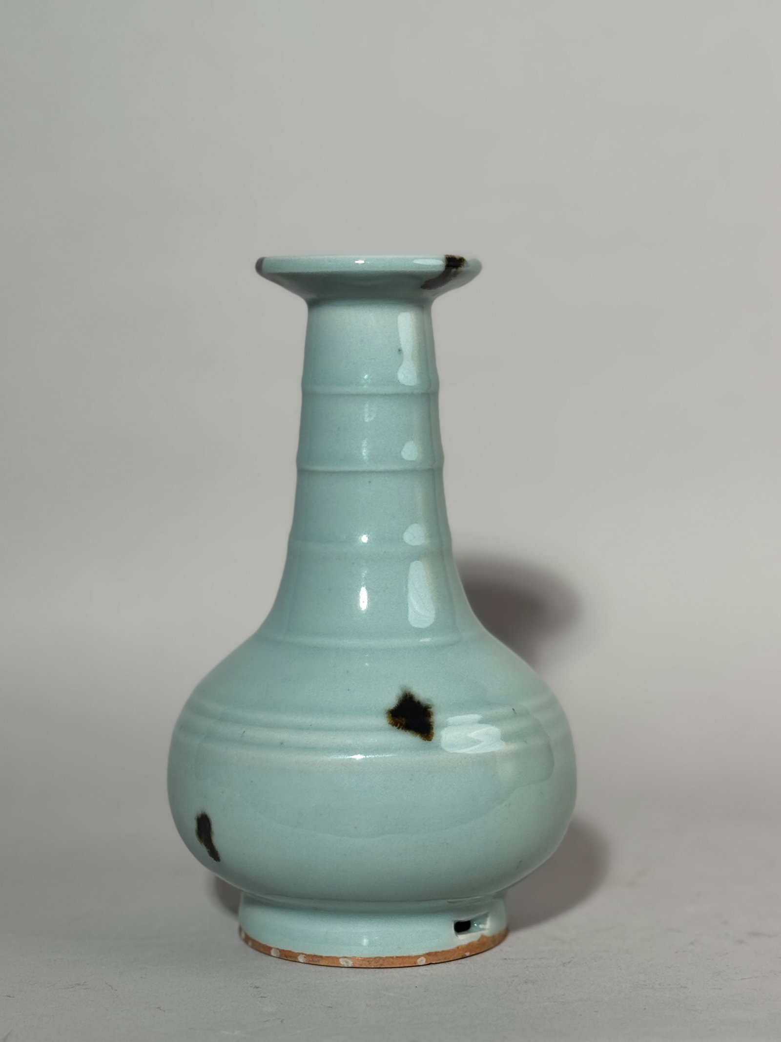 A CHINESE CELADON PORCELAIN VASE WITH BROWN SPLASH (1 of 14)