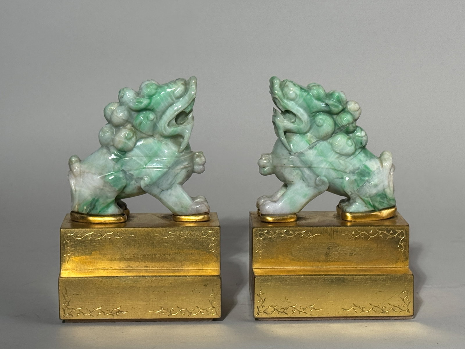 A PAIR OF CHINESE JADEITE FOO LIONS (1 of 7)