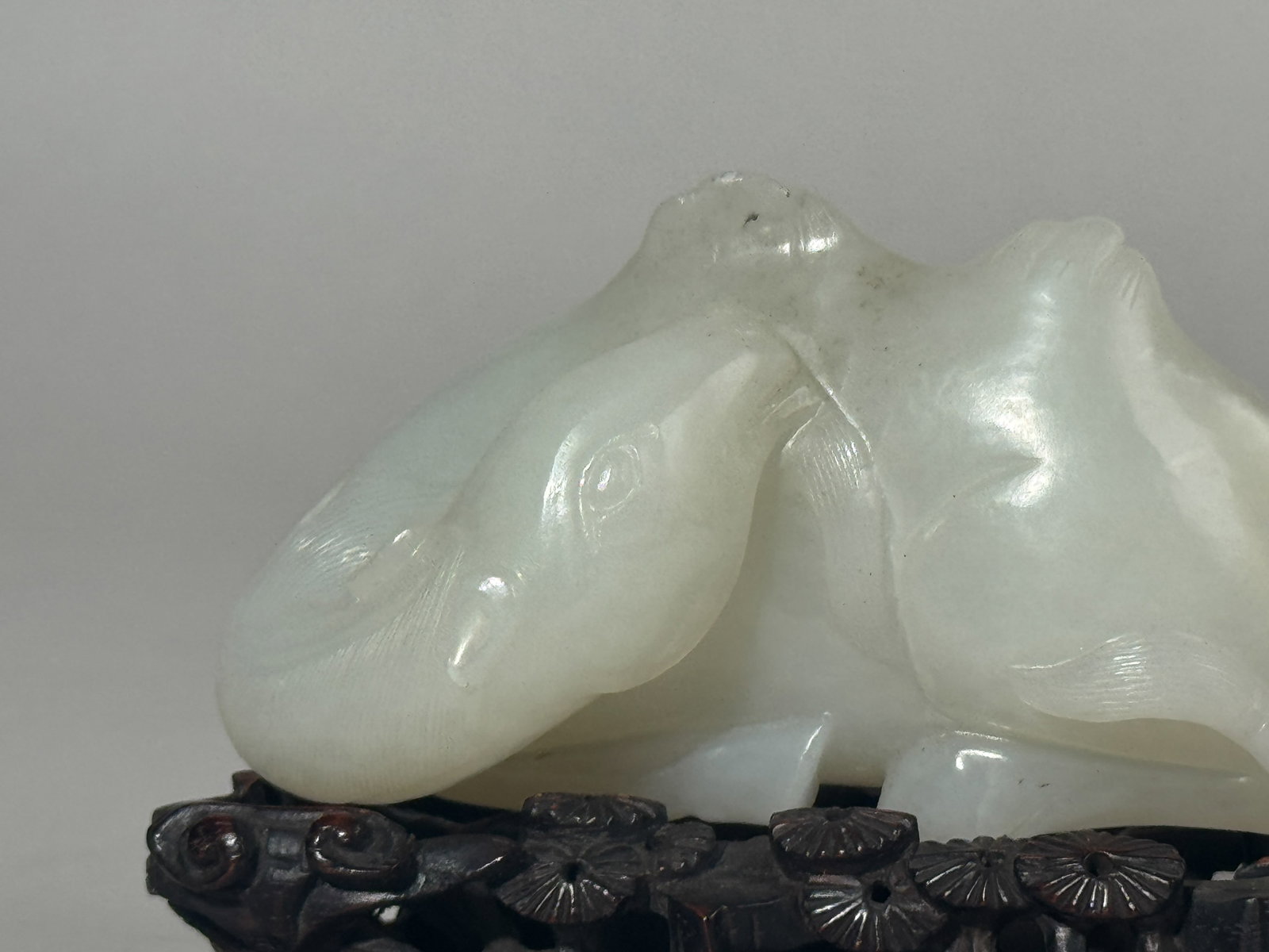 A CHINESE WHITE JADE CAMEL ON FANCY HARDWOOD STAND - 2