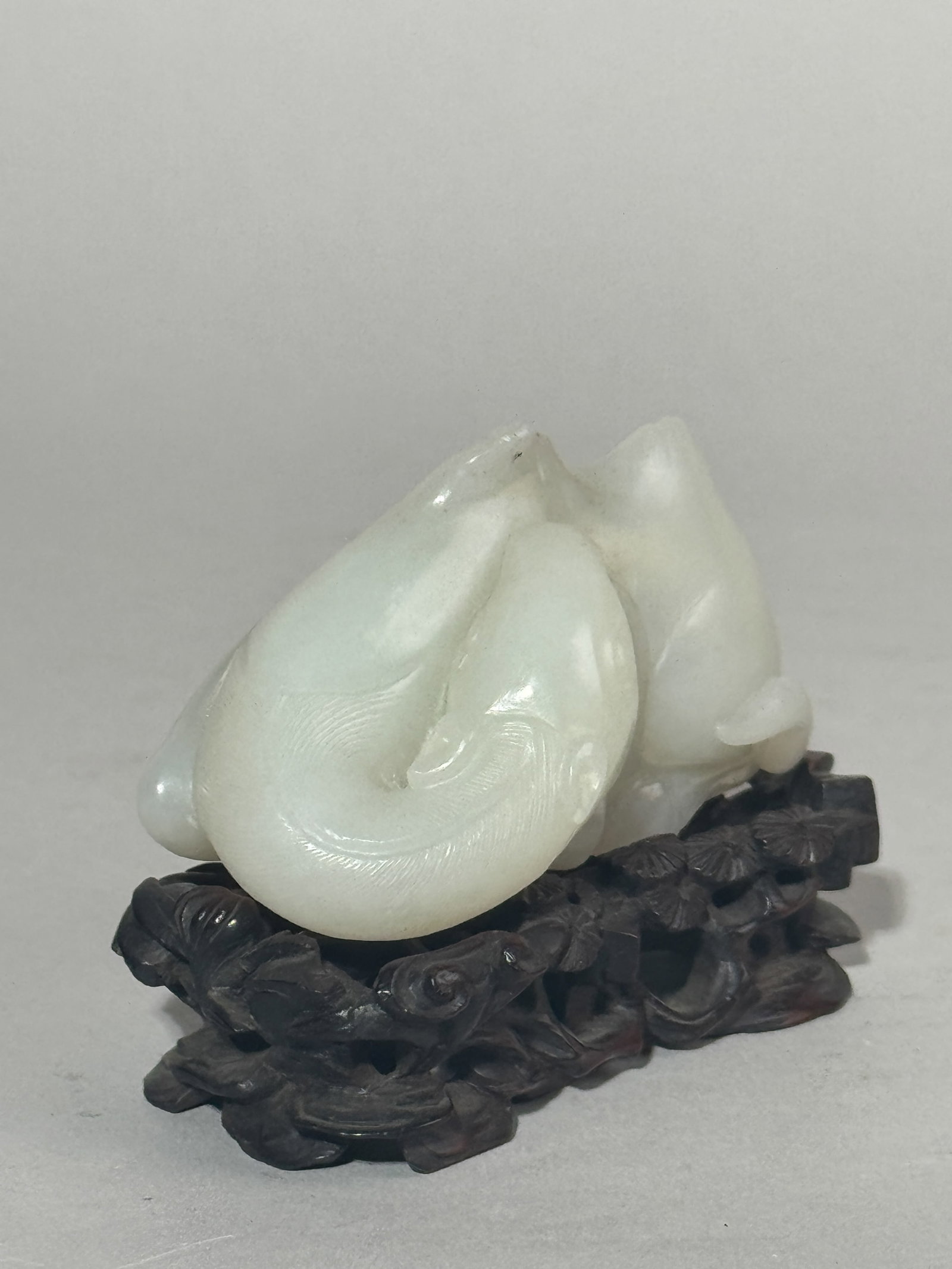 A CHINESE WHITE JADE CAMEL ON FANCY HARDWOOD STAND - 3